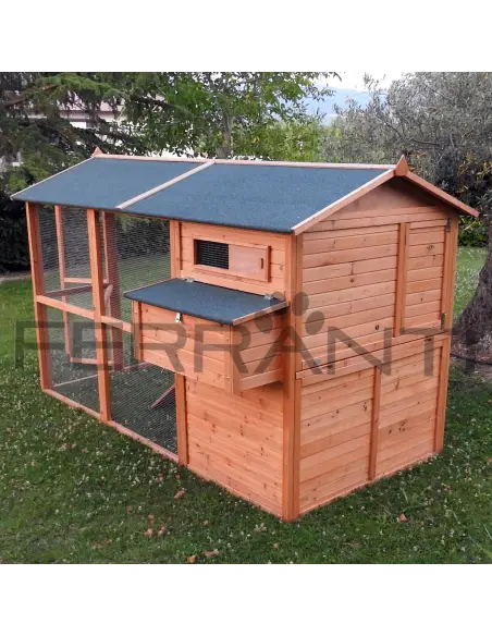 Back of wooden chicken coop with waste collection tray