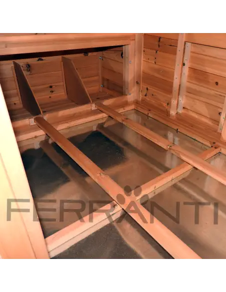 Interior of wooden chicken coop with removable tray for 10 hens