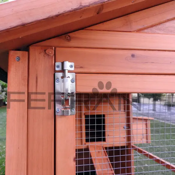 Door with locking latch and padlock fitting on wooden chicken coop for 10 hens