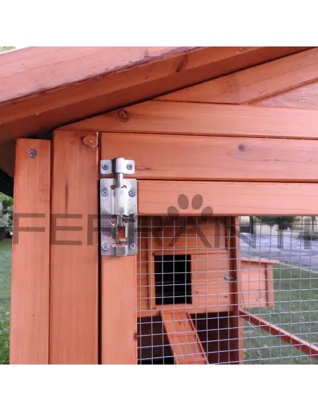 Door with locking latch and padlock fitting on wooden chicken coop for 10 hens