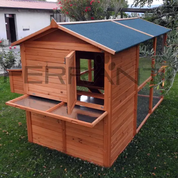 Back of wooden chicken coop with waste collection tray