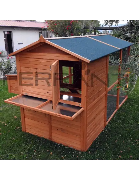 Back of wooden chicken coop with waste collection tray