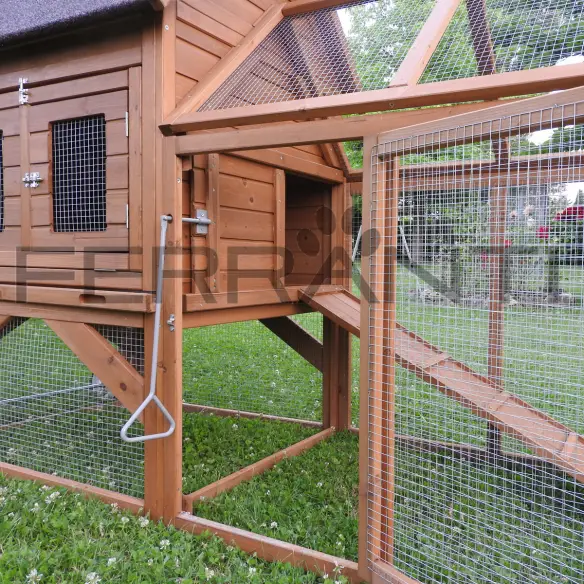 Interior of mobile chicken coop with lifting lever