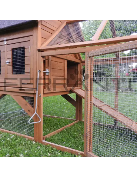 Interior of mobile chicken coop with lifting lever