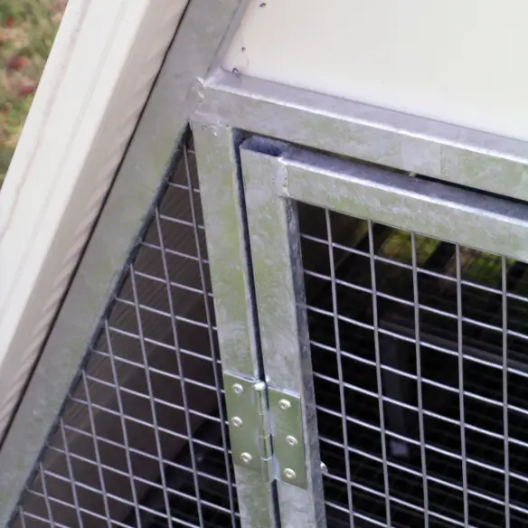 Entrance of insulated raised chicken coop for hens