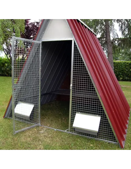 Door of ground chicken coop with locking latch and padlock fitting