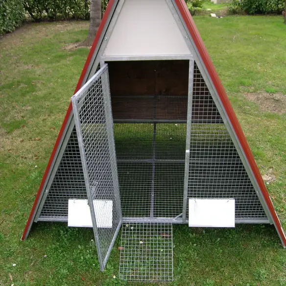 Door of raised chicken coop with locking latch and padlock fitting