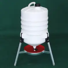 Raised tank waterer for chickens and hens