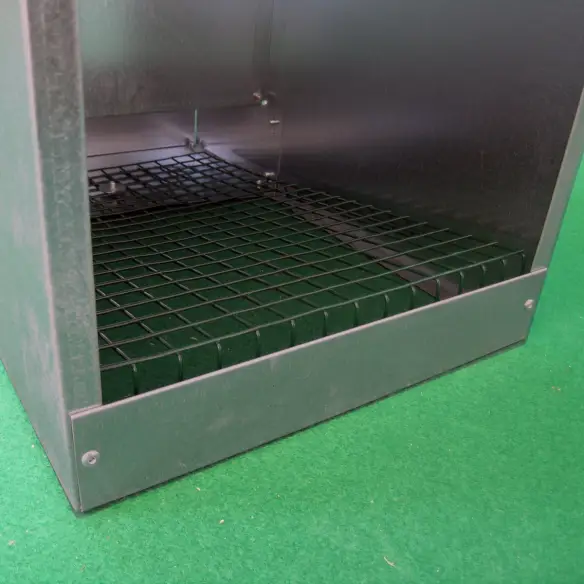 Nesting box with egg collection slide