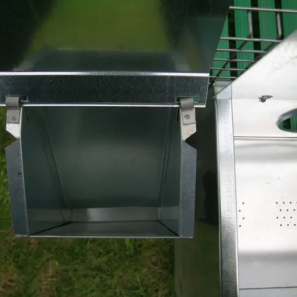 Interior detail of rabbit cage with accessories