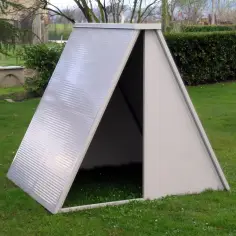 Insulated shelter for goats, pigs, and sheep made of sandwich panels