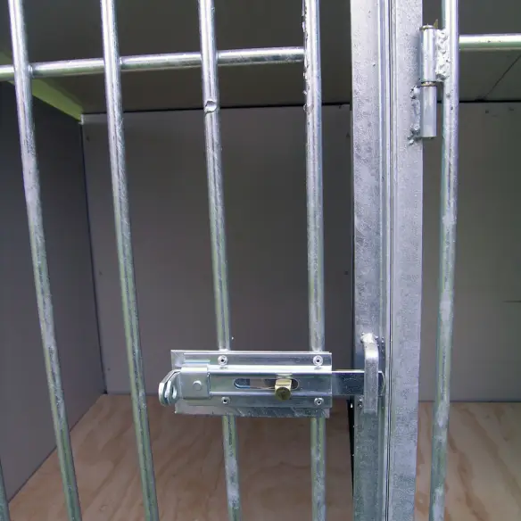 Entrance door of outdoor dog training kennel