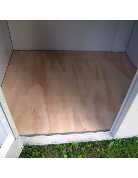 Entrance with raised wooden platform in sleeping area